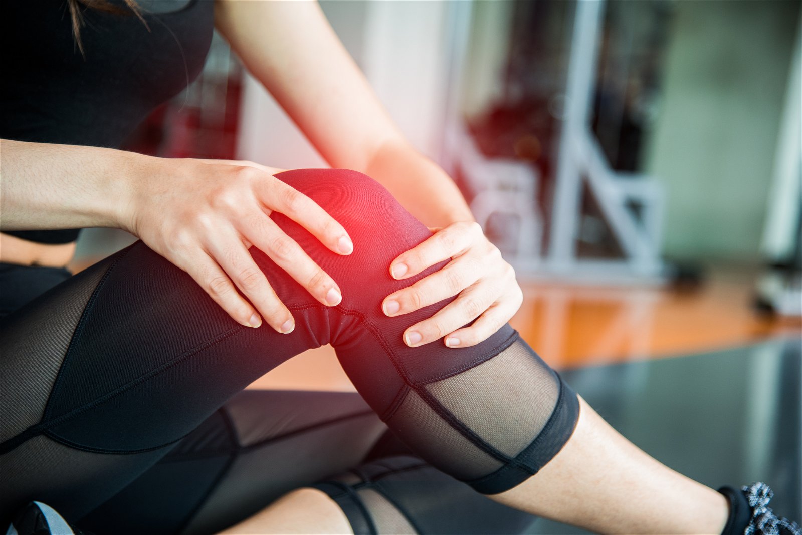 poškodba zvin kolena simptomi