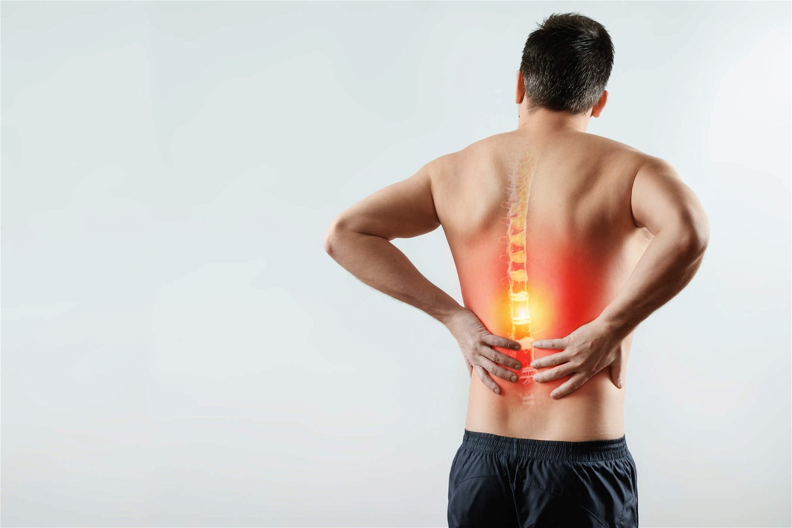 Pekoče bolečine v ledvenem delu hrbta simptomi